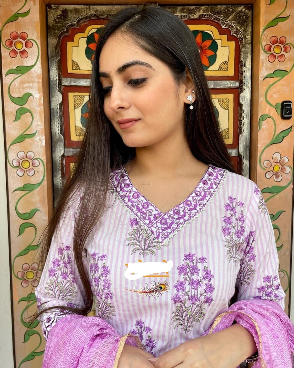 The Vibrant Purple Hue and Intricate Mugal Print