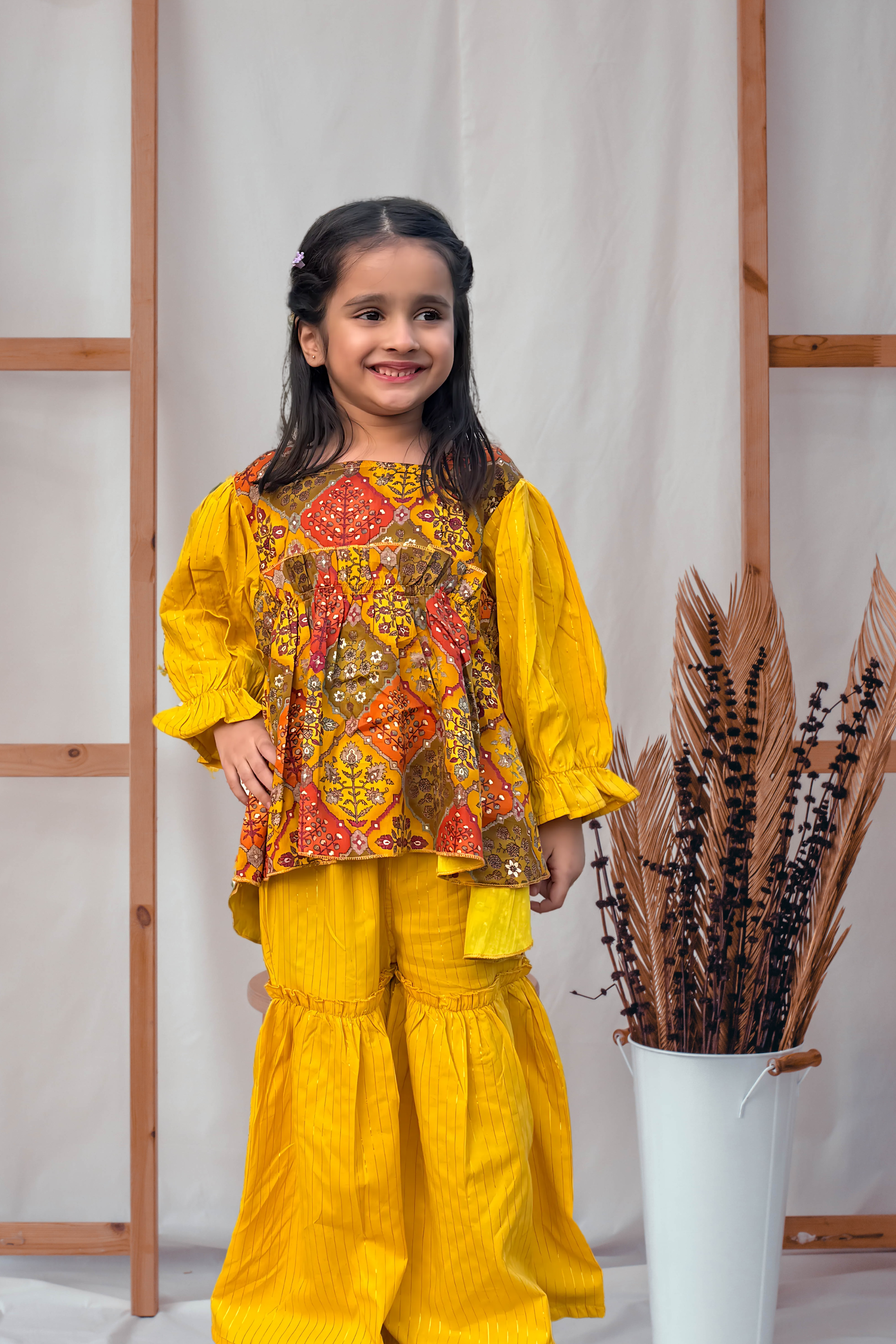 Girls High Low Printed Top with Sharara Set for Wedding Events Yellow