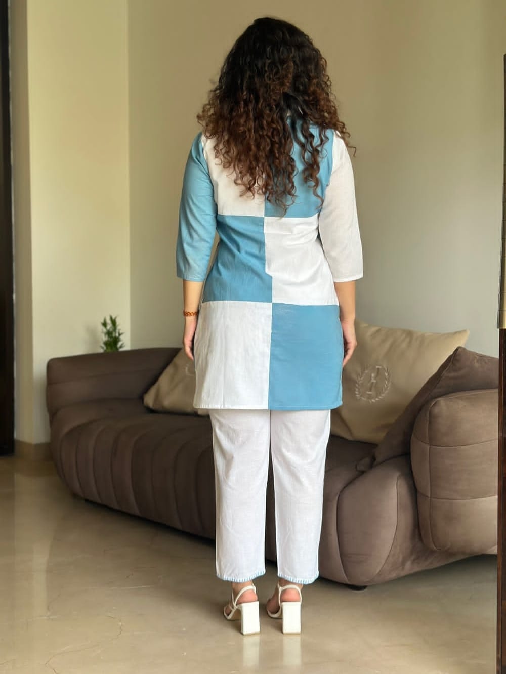 Back view of sea blue cotton co-ord set with fancy buttons