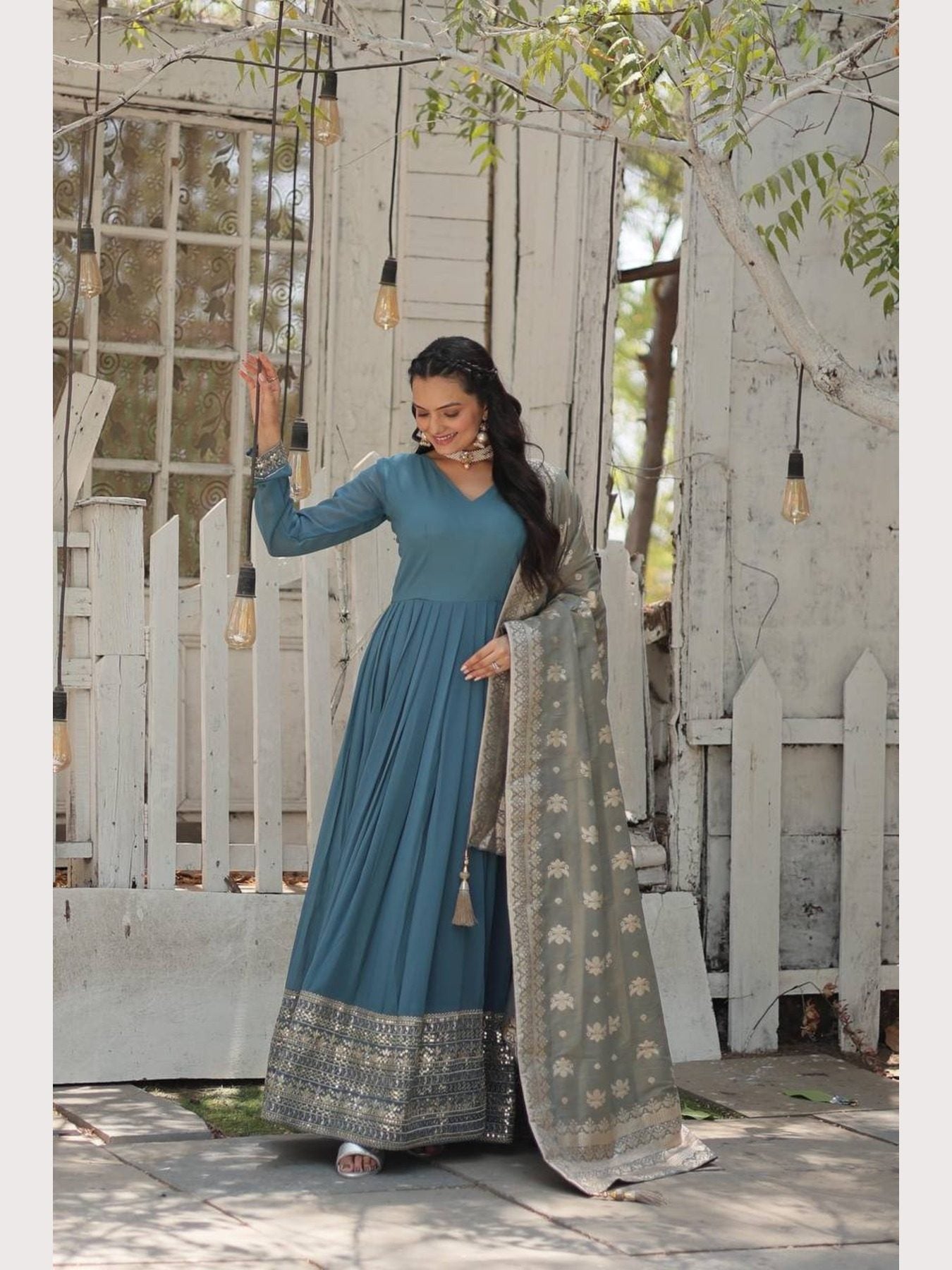 Elegant V-Neck Gown with Latkan Jhumka Border