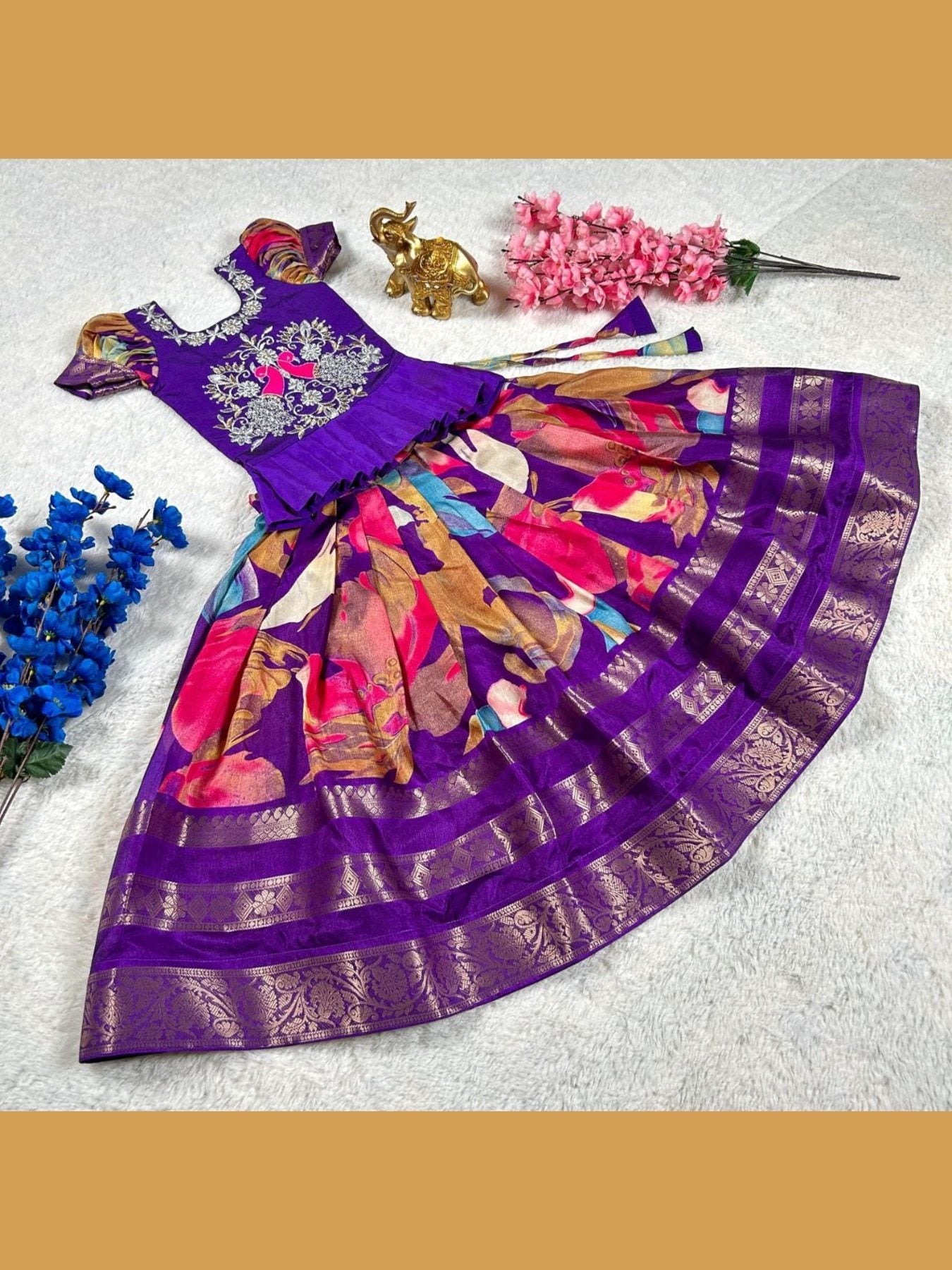 Colorful purple lehenga choli with floral patterns