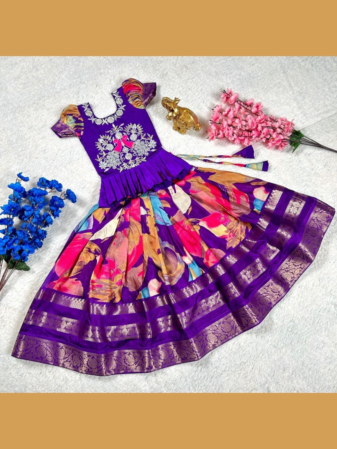 Purple embroidered lehenga choli with floral design