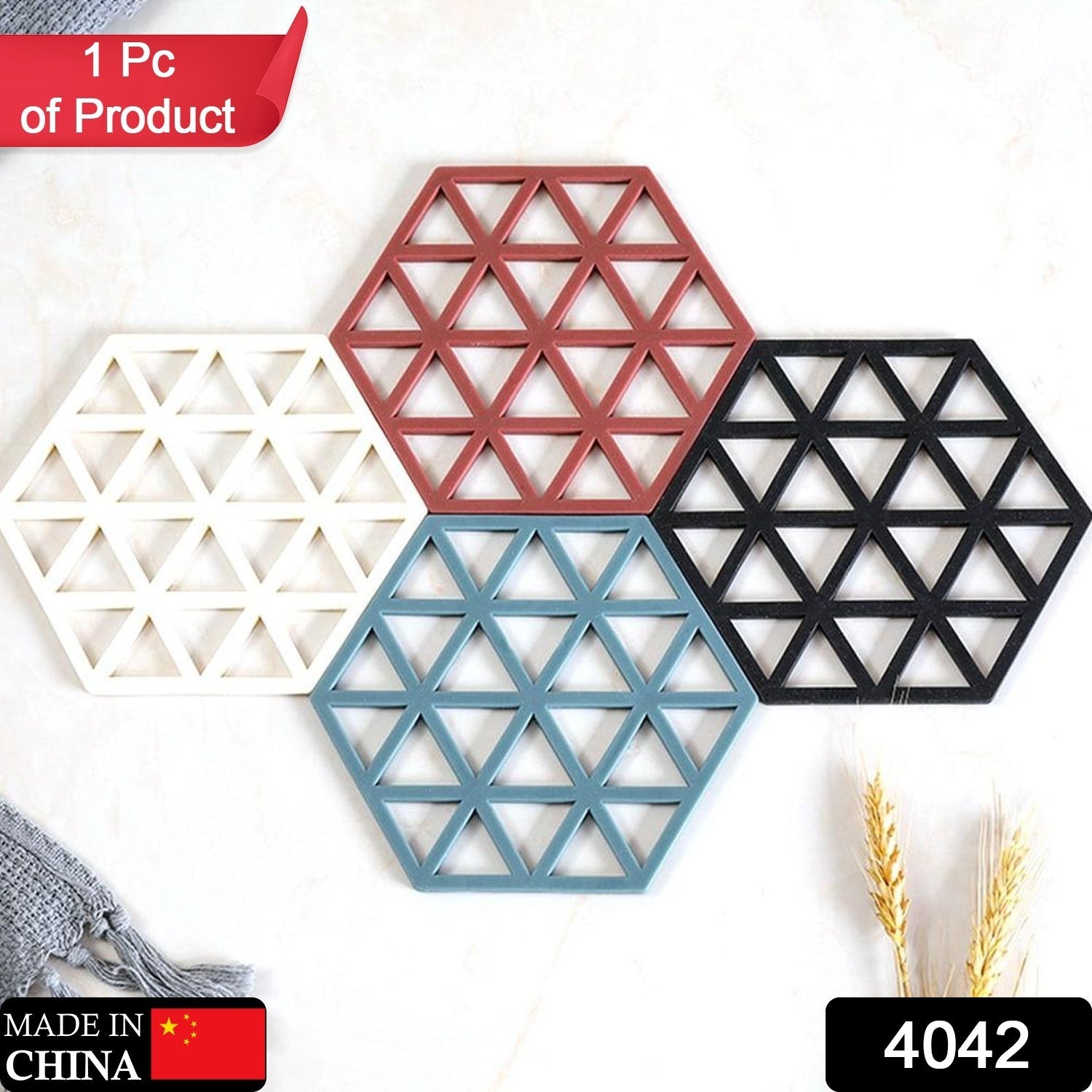 Set of multicolor hexagonal PVC tea coasters with a hollow geometric design, ideal as non-slip placemats for heat resistance.