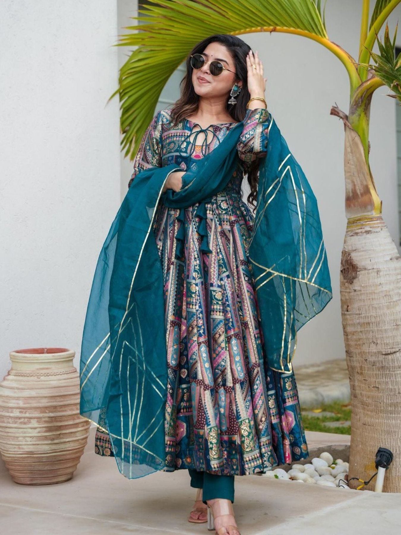 Model in digital printed Anarkali gown with dupatta